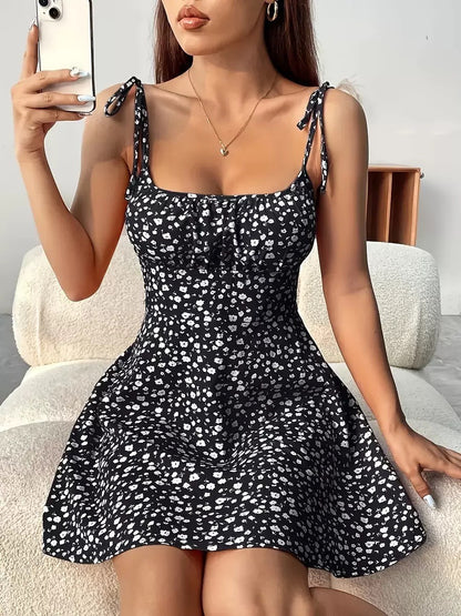 Robe d'Été Évasée à Imprimé Floral – Silhouette Affinée & Style Romantique