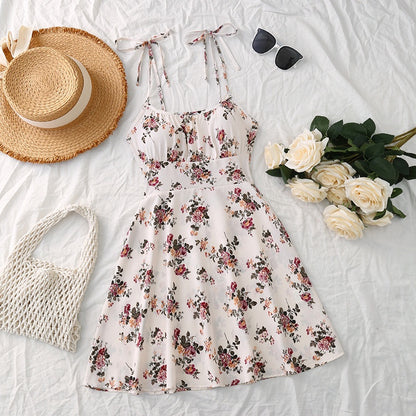 Robe d'Été Évasée à Imprimé Floral – Silhouette Affinée & Style Romantique