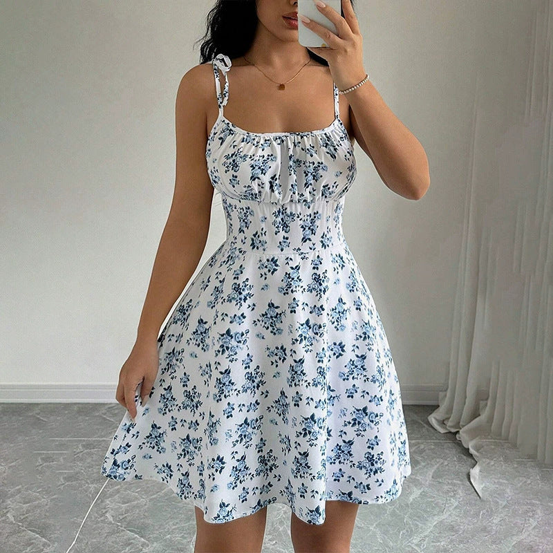 Robe d'Été Évasée à Imprimé Floral – Silhouette Affinée & Style Romantique